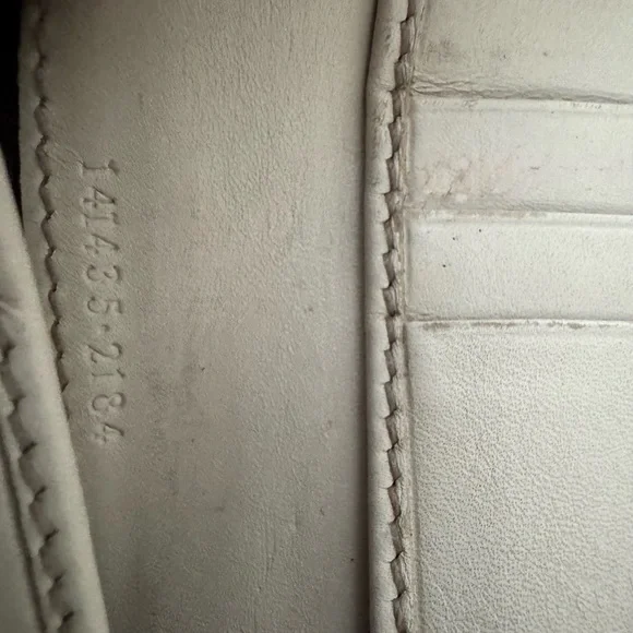 Gucci Guccissima Ivory Leather GG Logo BiFold Wallet, Gold Piston Closure